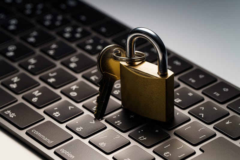 Cyber attack padlock keyboard.