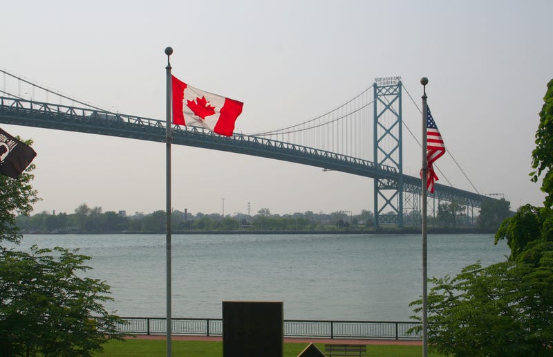 Suspension bridge, American and Canadian flag