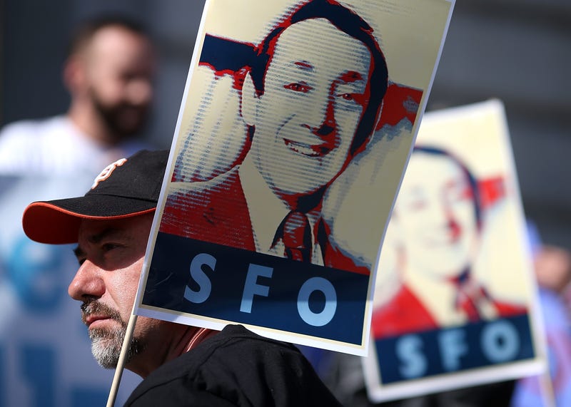 Supporters hold signs with the image of slain San Francisco supervisor Harvey Milk during a rally at San Francisco City Hall on February 22, 2013 in San Francisco, California.