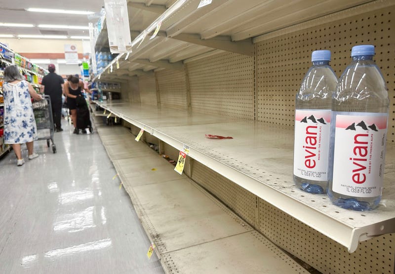 Shelves are nearly empty of bottled water in a grocery store as people stock up as Hurricane Hilary approaches on August 19, 2023 in Los Angeles, California. Southern California is under a first-ever tropical storm warning as Hurricane Hilary approaches with parts of California, Arizona, and Nevada preparing for flooding, high winds, and heavy rains. (Photo by Mario Tama/Getty Images)