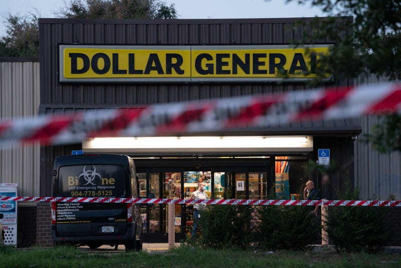 A biohazard cleanup vehicle is parked outside the Dollar General store where three people were shot and killed the day before on August 27, 2023 in Jacksonville, Florida.