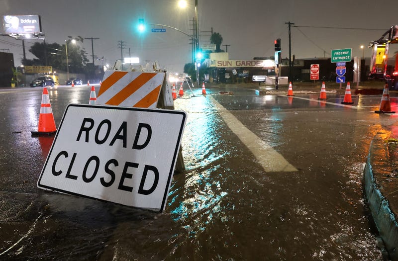 SUN VALLEY, CALIFORNIA - AUGUST 20: An entrance to southbound Interstate 5 is blocked due to flooding as tropical storm Hilary moves through the area on August 20, 2023 in Sun Valley, California. Southern California is under a first-ever tropical storm warning as Hilary impacts parts of California, Arizona and Nevada. All California state beaches have been closed in San Diego and Orange counties in preparation for the impacts from the storm which was downgraded from hurricane status.