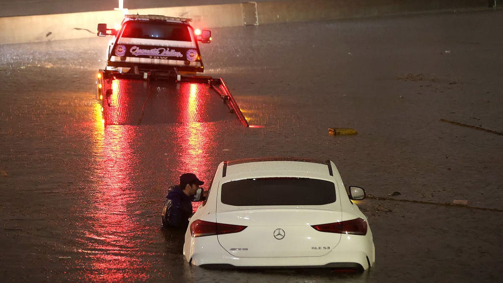 Flooding, 911 outages, more, as Hilary pushes north, now downgraded to post-tropical cyclone