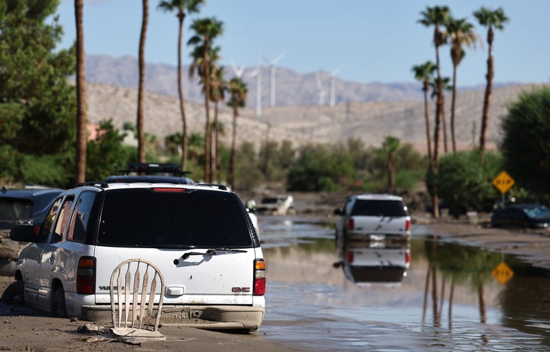 cars stranded in flooded street