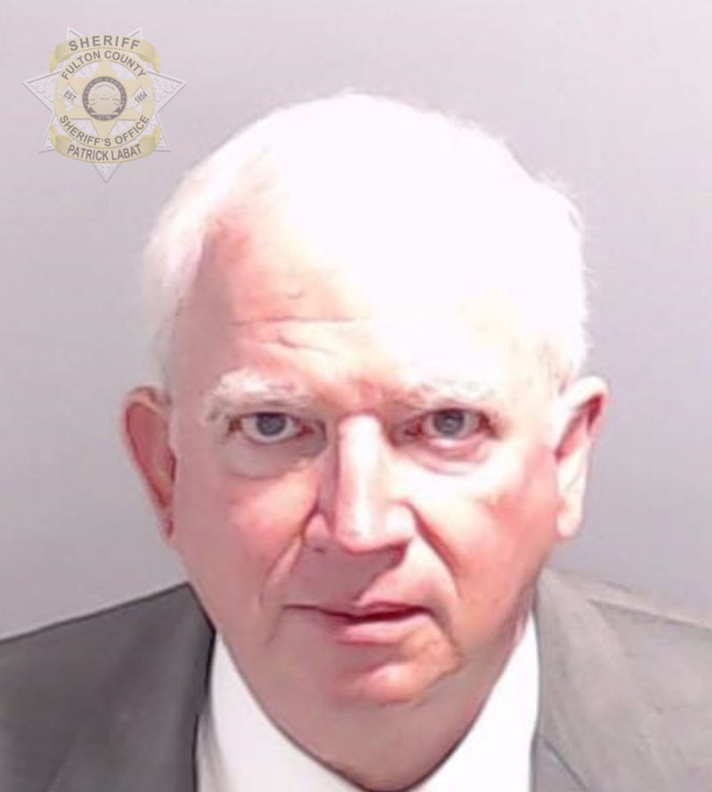In this handout provided by the Fulton County Sheriff's Office, John Eastman, former lawyer to former U.S. President Donald Trump poses for his booking photo on August 22, 2023 in Atlanta, Georgia.