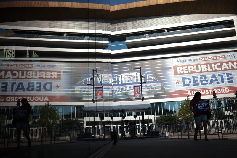 A supporter of Republican presidential candidate former U.S. President Donald Trump tours the exterior of the Fiserv Forum on Aug. 23, 2023, in Milwaukee, Wisconsin.