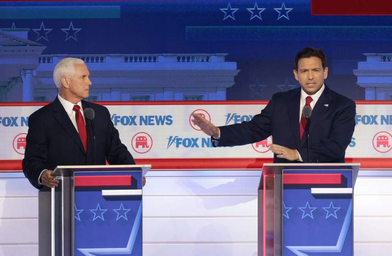 Republican presidential candidates (L-R), former U.S. Vice President Mike Pence and Florida Gov. Ron DeSantis participate in the first debate of the GOP primary season hosted by FOX News at the Fiserv Forum on August 23, 2023 in Milwaukee, Wisconsin. Eight presidential hopefuls squared off in the first Republican debate as former U.S. President Donald Trump, currently facing indictments in four locations, declined to participate in the event. (Photo by Win McNamee/Getty Images)
