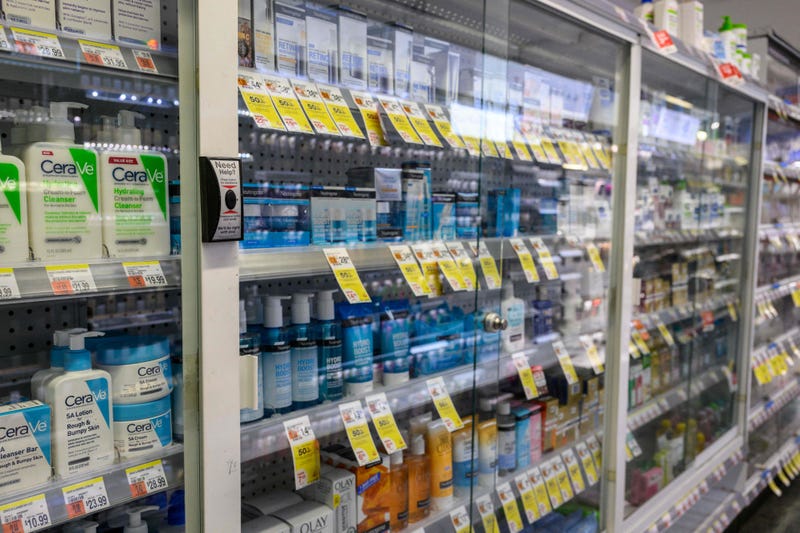 Locked-up items to prevent shoplifting are seen at a Duane Reade drugstore and pharmacy in New York City on August 24, 2023