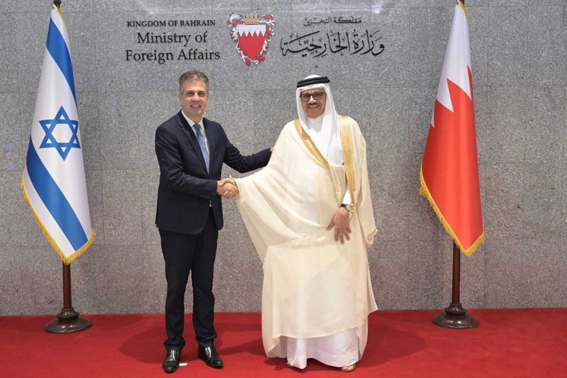 Israeli Foreign Minister Eli Cohen (L), and his Bahraini counterpart Abdullatif bin Rashid Al Zayani (R), shake hands as they hold a joint press conference after taking part in the official opening ceremony for Tel Aviv's embassy in the capital Manama, Bahrain on September 4, 2023.