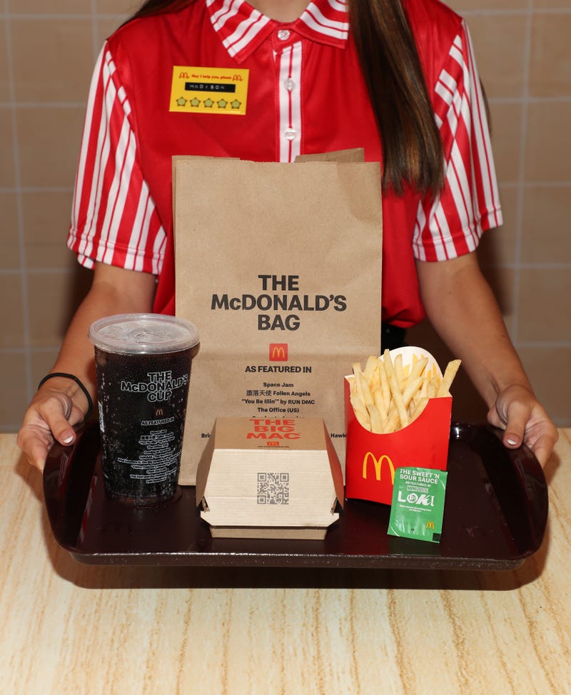 Workers are wearing the Ronald McDonald–inspired uniforms of yesteryear
