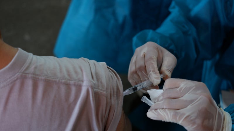 Person receives COVID-19 vaccine