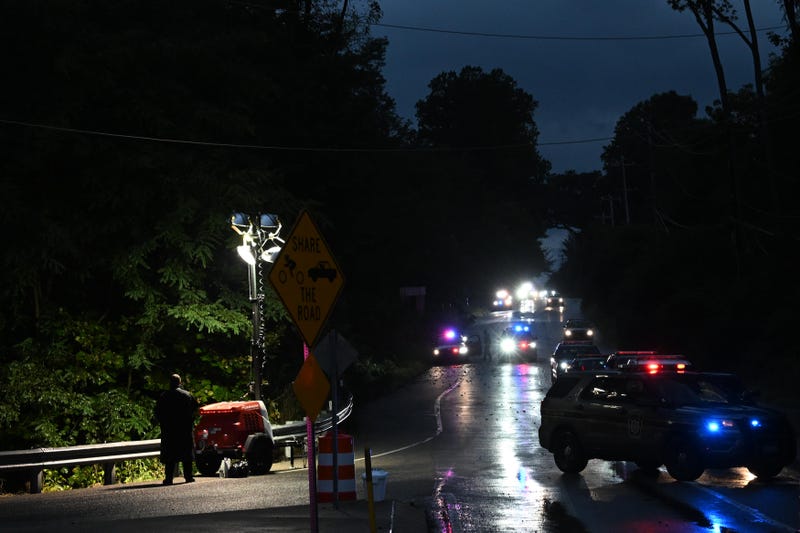 Police monitor a wooded perimeter for signs of convicted murderer Danilo Cavalcante in Kennett Square, Pennsylvania, on Sept. 9, 2023.