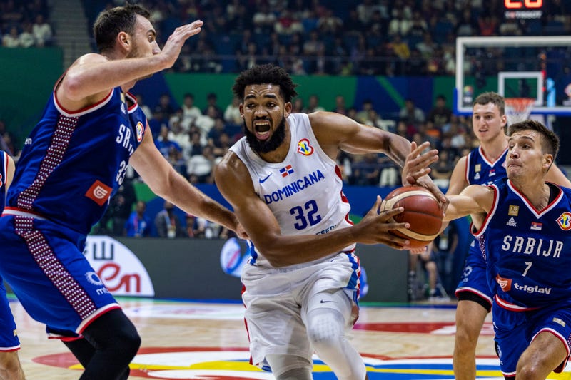 Karl-Anthony Towns #32 of Dominican Republic goes for the basket during the FIBA Basketball World Cup 2nd Round Group I game between Dominican Republic and Serbia at Araneta Coliseum on September 03, 2023 in Manila, Philippines.
