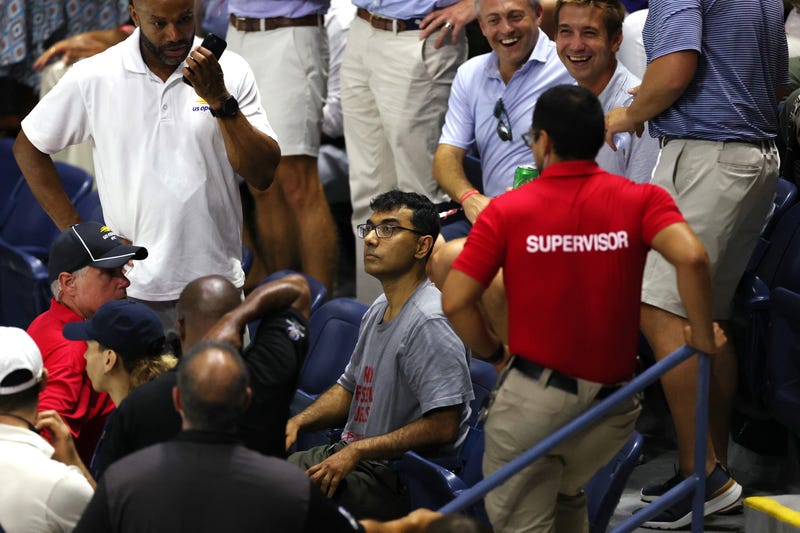 A protester disrupts the Women's Singles Semifinal match between Coco Gauff of the United States and Karolina Muchova of the Czech Republic on Day Eleven of the 2023 US Open at the USTA Billie Jean King National Tennis Center on September 7, 2023 in Queens