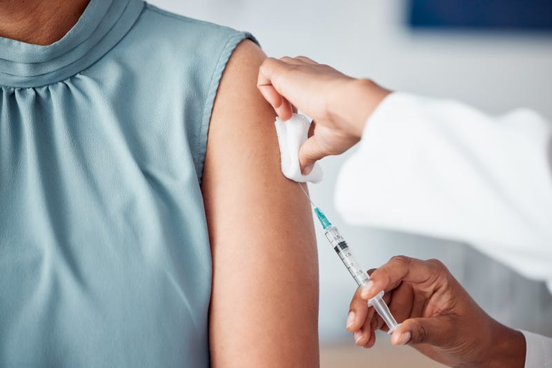 giving vaccines