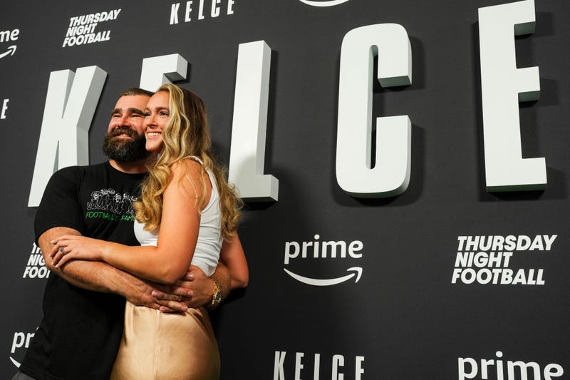 Jason Kelce poses for a photo with Kylie Kelce during the Kelce documentary premiere at Suzanne Roberts Theater on September 8, 2023 in Philadelphia, Pennsylvania.