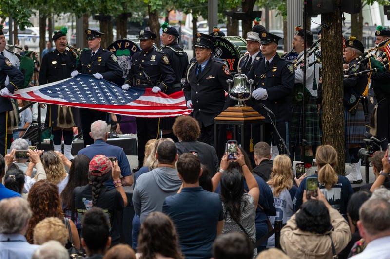 Firefighters and members of the police take part in the ceremony at the 9/11 Memorial and Museum in lower Manhattan during commemoration ceremonies for the 22nd anniversary of the attacks on September 11, 2023
