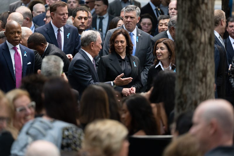 Former Mayor Michael Bloomberg stands with Vice President Kamala Harris (center) and Gov. Kathy Hochul as they attend services at the 9/11 Memorial and Museum. Mayor Eric Adams and former mayor Bill de Blasio are seen at the left