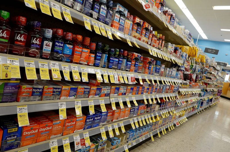 Cold and flu medicine sits on a store shelf
