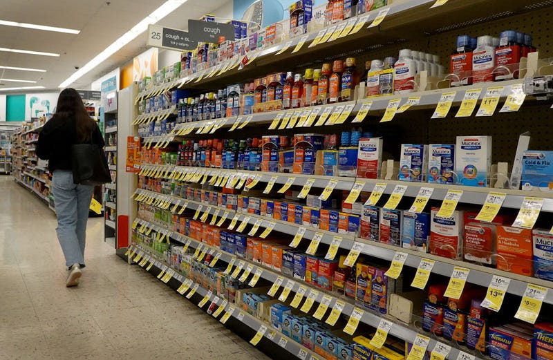 Cold and flu medicine sits on a store shelf