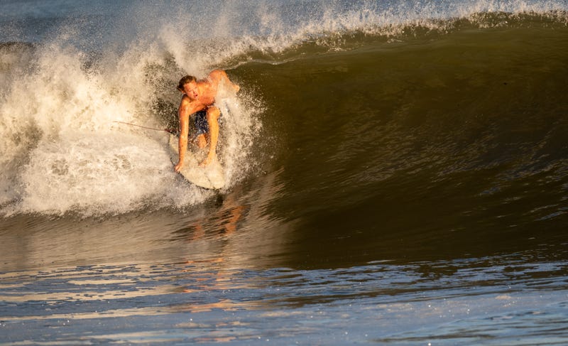 East Coast surfers took advantage of the Hurricane Lee's impact on Thursday before conditions from the offshore storm put them in too much danger.