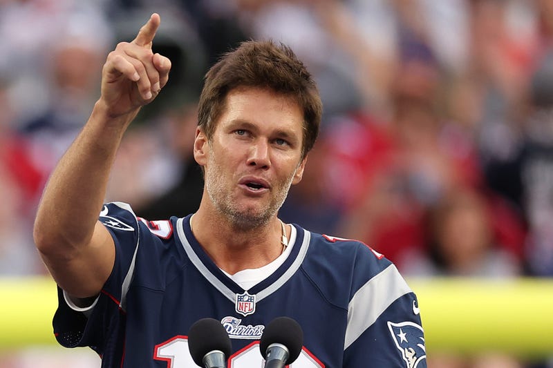 ormer New England Patriots quarterback Tom Brady speaks during a ceremony honoring him at halftime of New England's game against the Philadelphia Eagles at Gillette Stadium on September 10, 2023