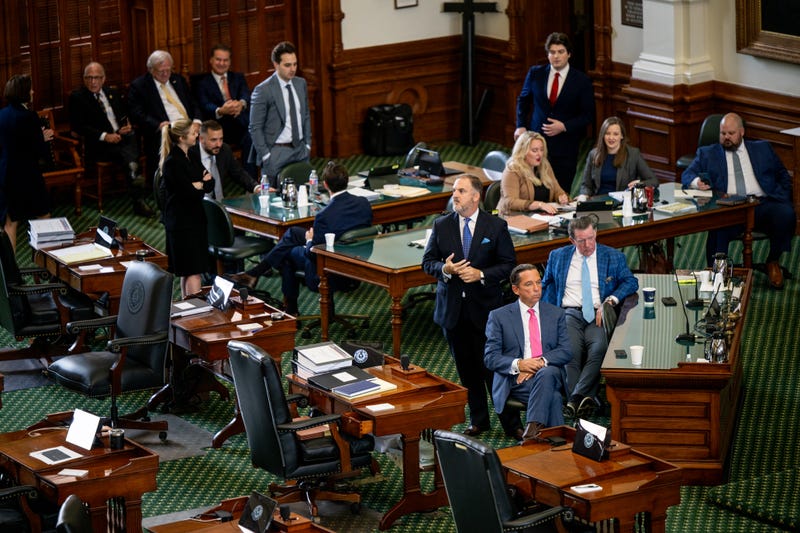 Former Texas State Attorney General Ken Paxton's defense team waits for the impeachment trial at the Texas State Capitol on Sept. 16, 2023, in Austin, Texas.