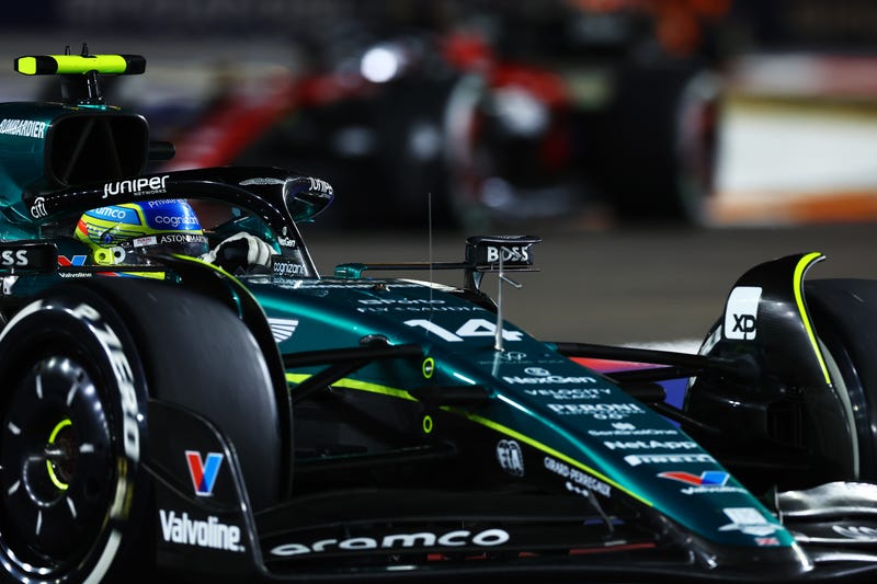 Fernando Alonso of Spain driving the (14) Aston Martin AMR23 Mercedes on track during the F1 Grand Prix of Singapore at Marina Bay Street Circuit on September 17, 2023