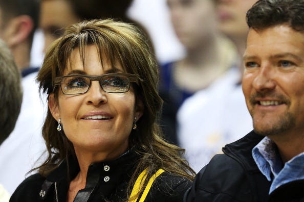 Sarah Palin and husband Todd catch a basketball game. 