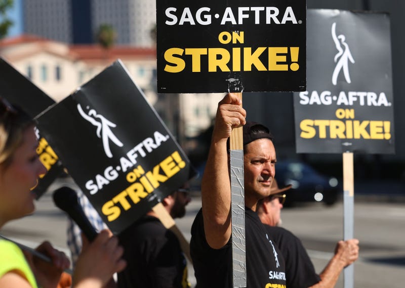Striking SAG-AFTRA members picket outside Warner Bros. Studio as the actors strike continues on September 26, 2023 in Burbank, California.