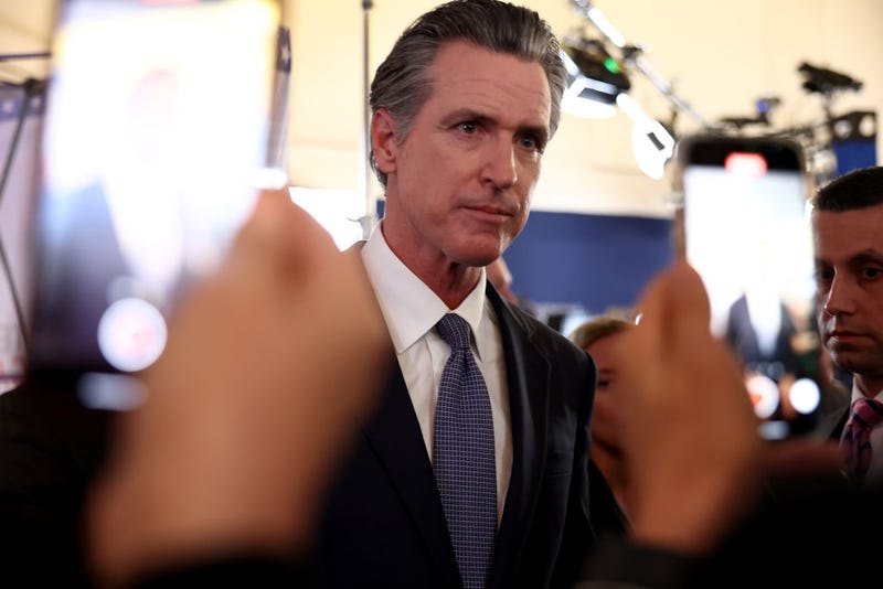 California Gov. Gavin Newsom talks to reporters in the spin room following the FOX Business Republican Primary Debate at the Ronald Reagan Presidential Library on September 27, 2023 in Simi Valley, California. Seven presidential hopefuls squared off in the second Republican primary debate as former U.S. President Donald Trump, currently facing indictments in four locations, declined again to participate. (Photo by Mario Tama/Getty Images)
