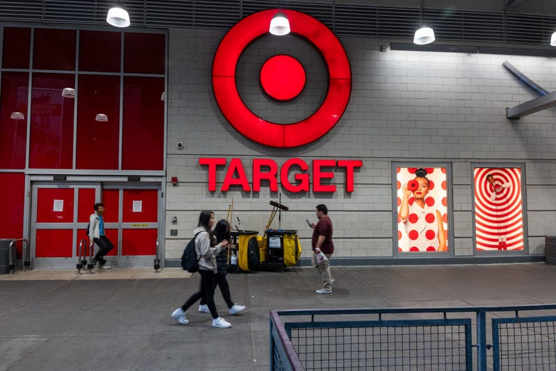 People walk by a Target store in the Harlem neighborhood in Manhattan on September 28, 2023 in New York City.