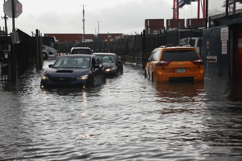 Cars sit stuck in the flooded streets in the Red Hook neighborhood on September 29, 2023 in the Brooklyn borough of New York City.