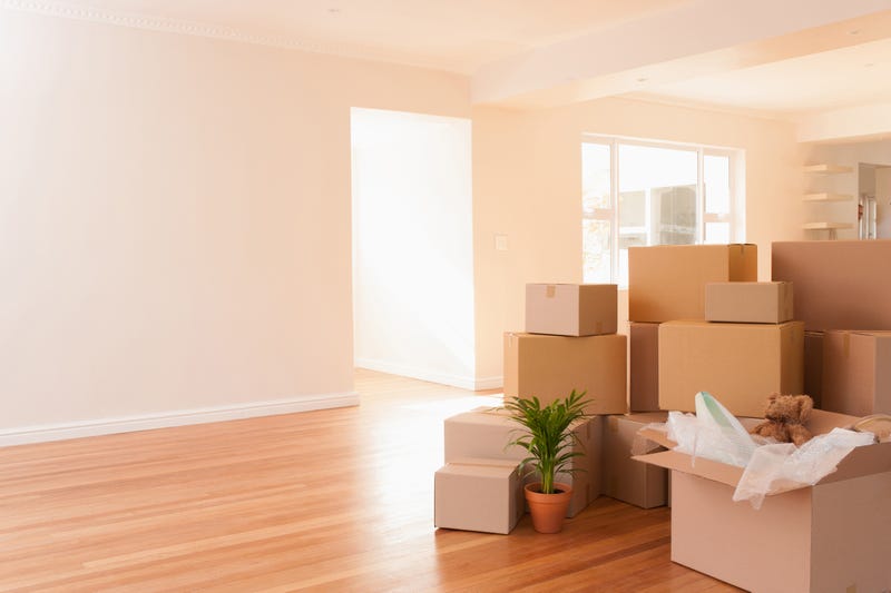 Boxes stacked on floor of new home
