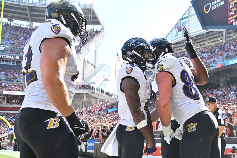Lamar Jackson #8 of the Baltimore Ravens and Mark Andrews #89 of the Baltimore Ravens celebrate after Andrews' receiving touchdown during the second quarter against the Cleveland Browns at Cleveland Browns Stadium on October 01, 2023 in Cleveland, Ohio.  
