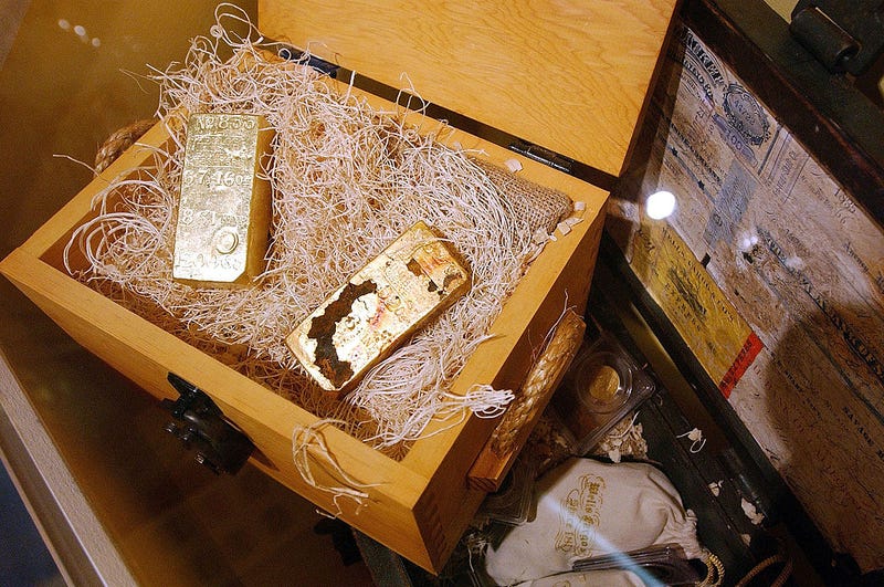Gold bars taken from the S.S. Central America ship which sank in 1857 are displayed at the Museum of American Financial History January 8, 2003 in New York City. The museum, an affiliate of the Smithsonian Institution, showcases the history of capital markets in the U.S., including scandals, recessions and bull markets. (Photo by Spencer Platt/Getty Images)