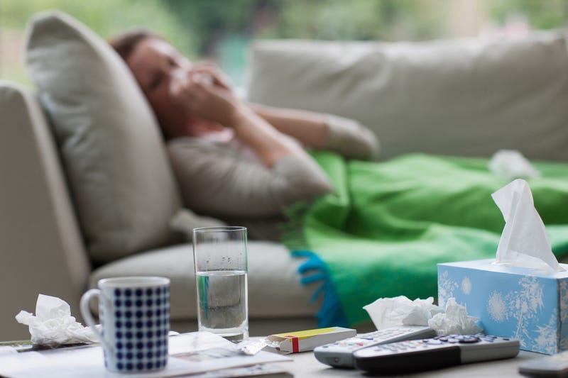 Person sick on the couch. 