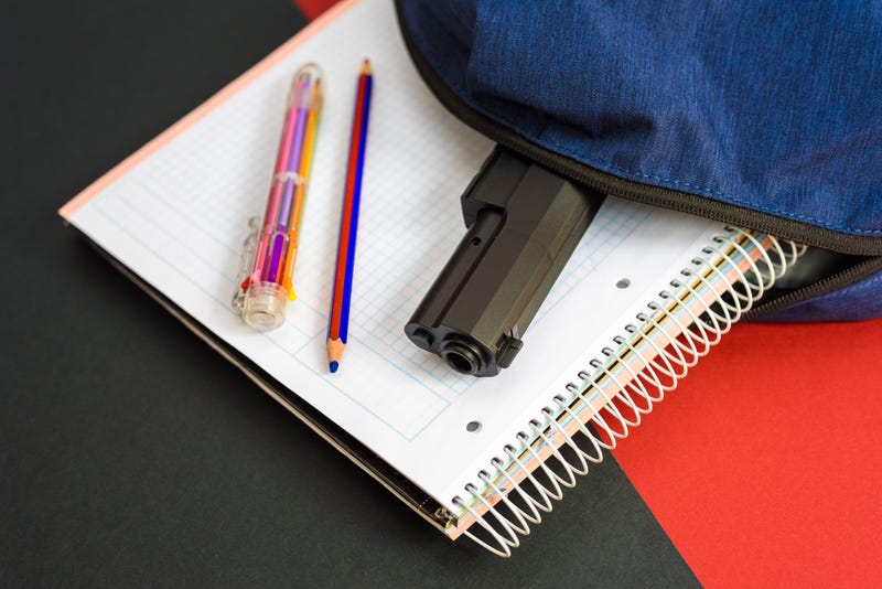 gun in backpack