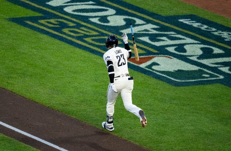 Royce Lewis #23 of the Minnesota Twins tosses his bat aside on his way to first base after hitting a home run in the first inning during Game Four of the Division Series against the Houston Astros at Target Field on October 11, 2023 in Minneapolis, Minnesota.