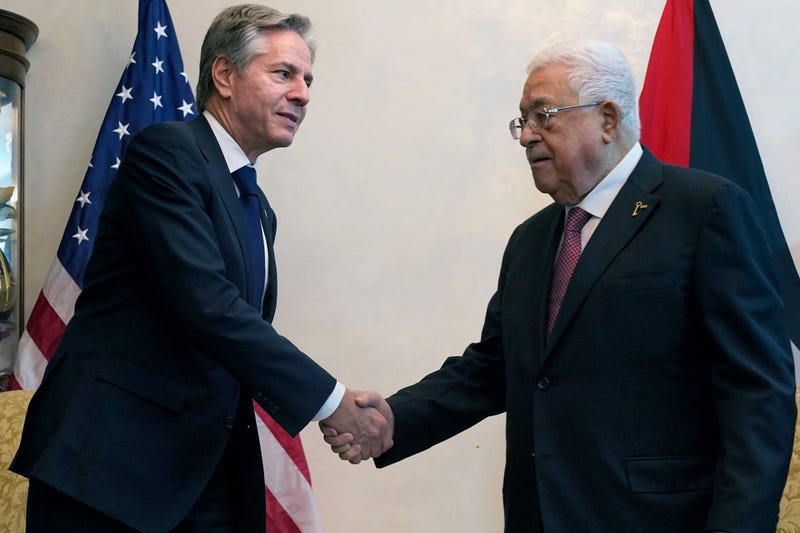 U.S. Secretary of State Antony Blinken shakes hands with Palestinian President Mahmoud Abbas