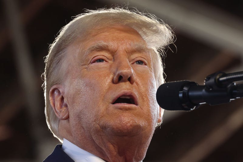 Republican presidential candidate former President Donald Trump speaks to guests during a rally on October 07, 2023 in Waterloo, Iowa. 