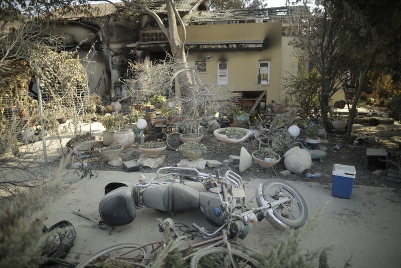 Destroyed houses at a kibbutz that was attacked near the border with Gaza on October 14, 2023 in Be’eri, Israel. Israel has sealed off Gaza and launched sustained retaliatory air strikes, which have killed at least 1,400 people with more than 400,000 displaced, after a large-scale attack by Hamas. On October 7, the Palestinian militant group Hamas launched a surprise attack on Israel from Gaza by land, sea, and air, killing over 1,300 people and wounding around 2,800. Israeli soldiers and civilians have also been taken hostage by Hamas and moved into Gaza. The attack prompted a declaration of war by Israeli Prime Minister Benjamin Netanyahu and the announcement of an emergency wartime government. (Photo by Amir Levy/Getty Images)