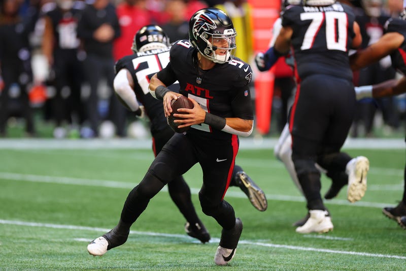Desmond Ridder #9 of the Atlanta Falcons drops back to pass in the first quarter against the Houston Texans at Mercedes-Benz Stadium
