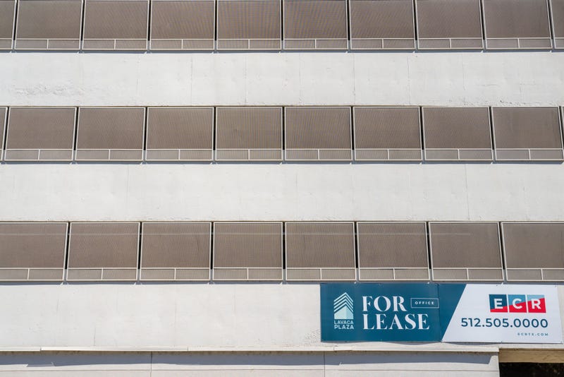 Advertisement for a building designated for office space is seen downtown on October 09, 2023 in Austin, Texas. An increase in empty office spaces around the country threatens to diminish U.S. business districts. (Photo by Brandon Bell/Getty Images)