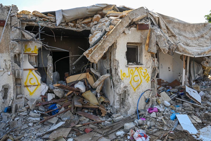 A view of a house left in ruins after an attack by Hamas militants on this kibbutz days earlier when dozens of civilians were killed near the border with Gaza, on October 10, 2023 in Kfar Gaza, Israel.