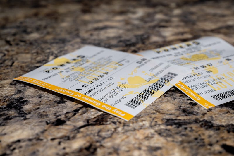 In a photo illustration, Powerball lottery tickets are seen on a countertop on Oct. 10, 2023, in Austin, Texas.
