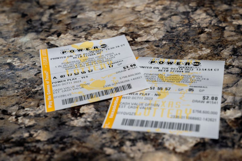 In a photo illustration, Powerball lottery tickets are seen on a countertop on October 10, 2023 in Austin, Texas. 