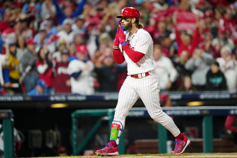 Bryce Harper touches home plate after hitting a solo home run in the first inning during Game 1 of the NLCS between the Arizona Diamondbacks and the Philadelphia Phillies at Citizens Bank Park on Monday, October 16, 2023 in Philadelphia, Pennsylvania.