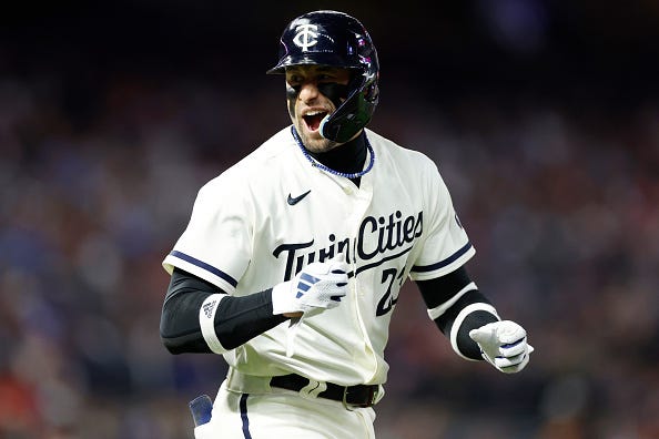 Royce Lewis #23 of the Minnesota Twins reacts after drawing a walk against the Houston Astros during the sixth inning in Game Four of the Division Series at Target Field on October 11, 2023 in Minneapolis, Minnesota.