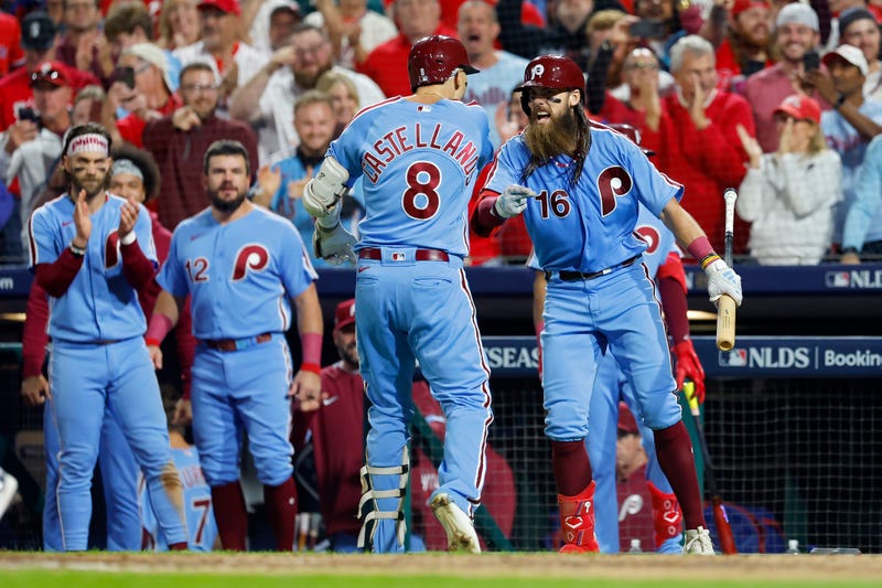 Nick Castellanos and Brandon Marsh of the Philadelphia Phillies celebrate after Castellanos hit a home run in the sixth inning against the Atlanta Braves in Game Four of the Division Series Thursday night.